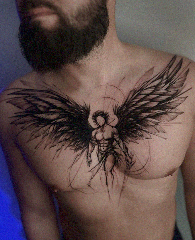 Man Bares Chest Armor of Angelic Wings