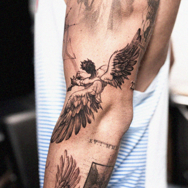 Angelic Ink Masterpiece on Human Canvas
