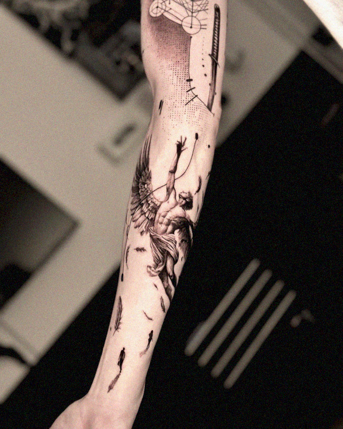 Angelic Intricacy in Black and White Tattoo