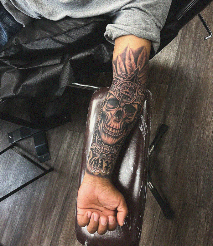 Showcasing Tribal Skull Tattoo Mastery