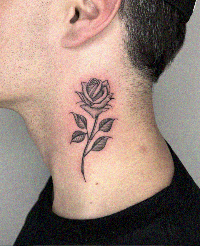 Neck Adorned with a Rose Tattoo