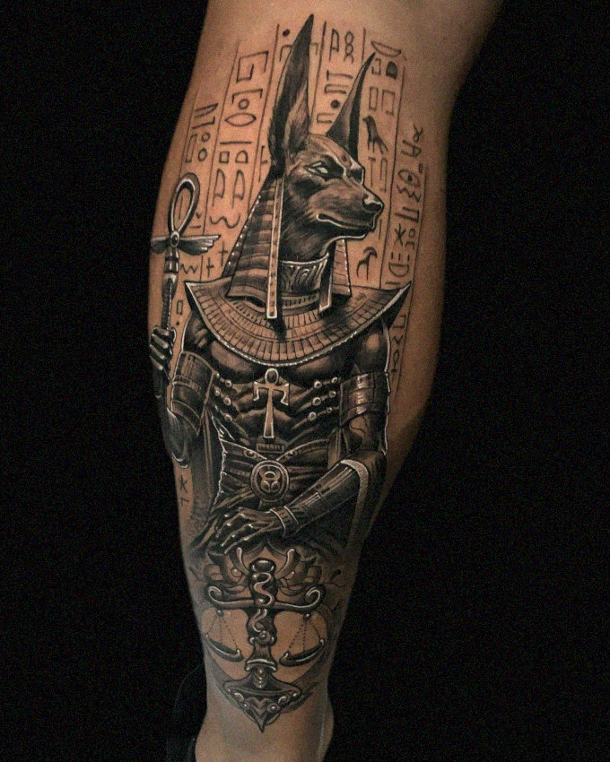 Anubis Tattoo Embraced by Hieroglyphics
