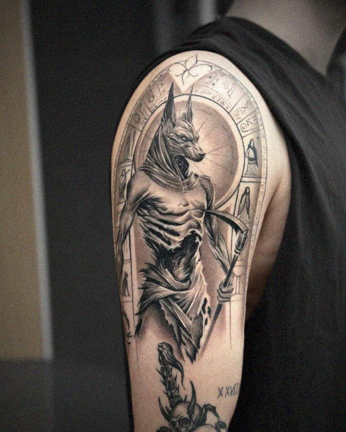 Anubis Tattoo Framed in Ornate Artistry
