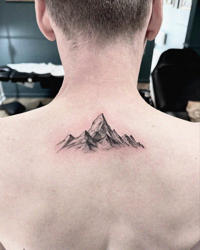 Mountains Inked on Skin Canvas