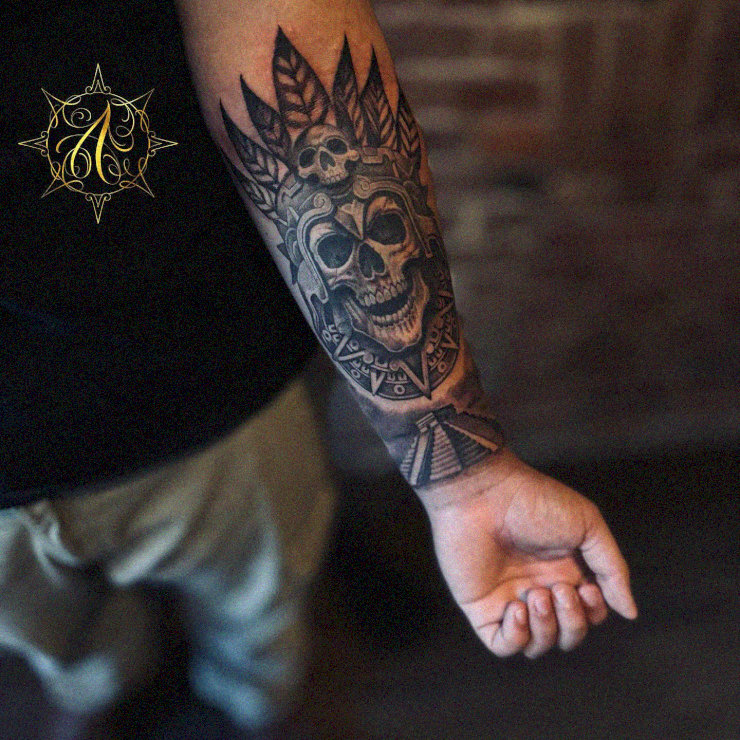 Inked Elegance in Skulls and Feathers