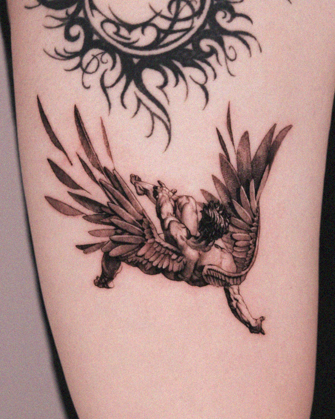 Imposing Angel Tattoo in Monochrome
