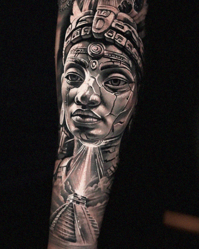 Inked Elegance: Traditional Woman's Portrait Tattoo
