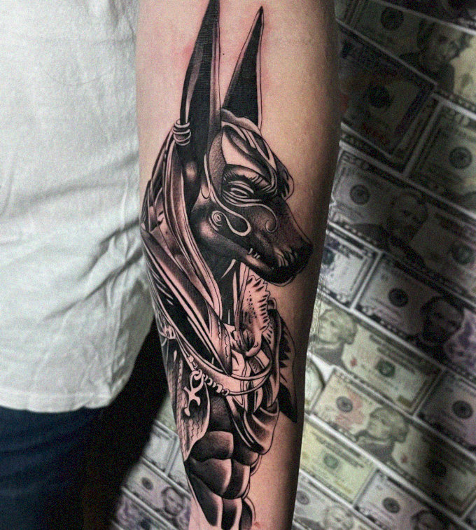 Mythical Anubis Tattooed in Shades of Night