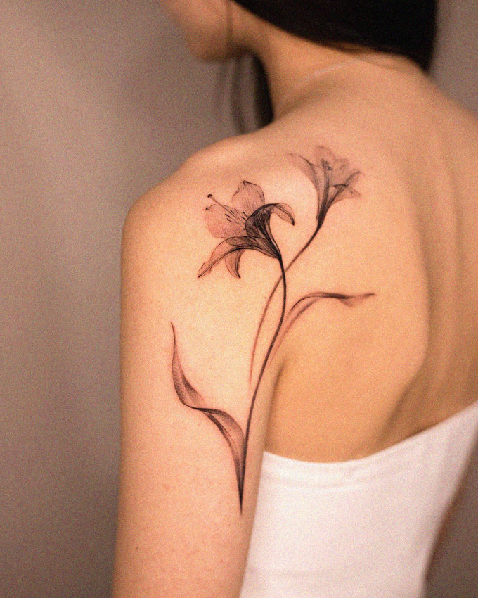 Floral Ink Unfolding on Her Skin