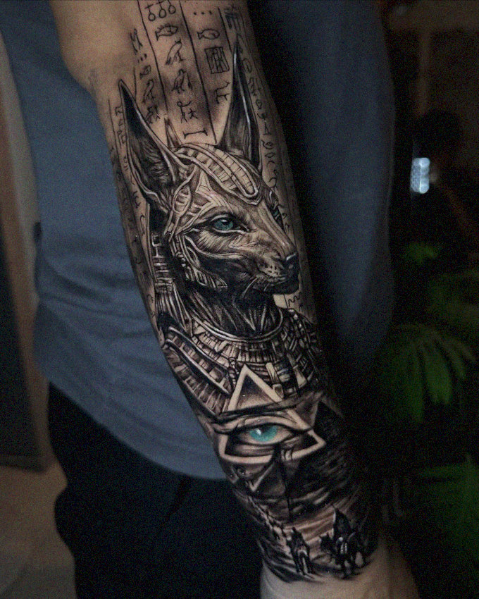 Arm Tattoo Displaying Mythical Anubis Imagery