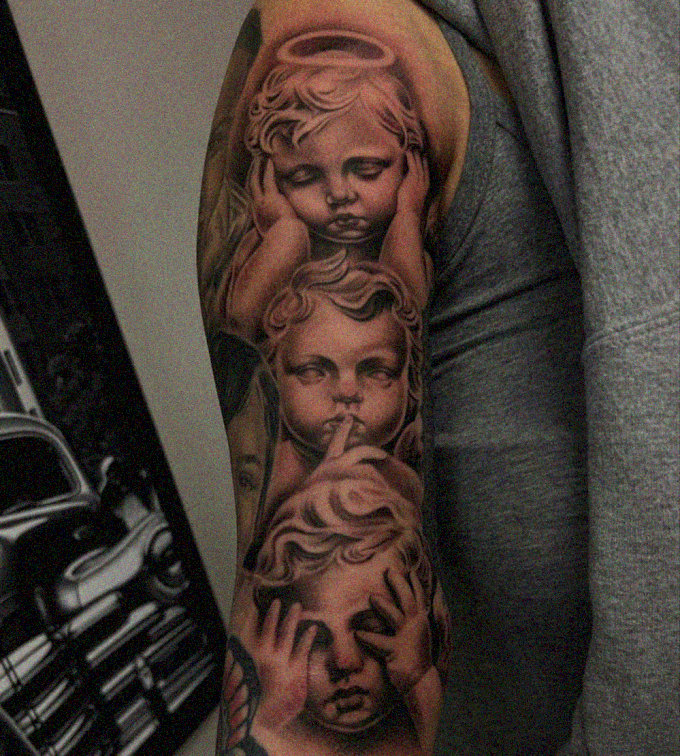 Angelic Figures Inked on Human Canvas