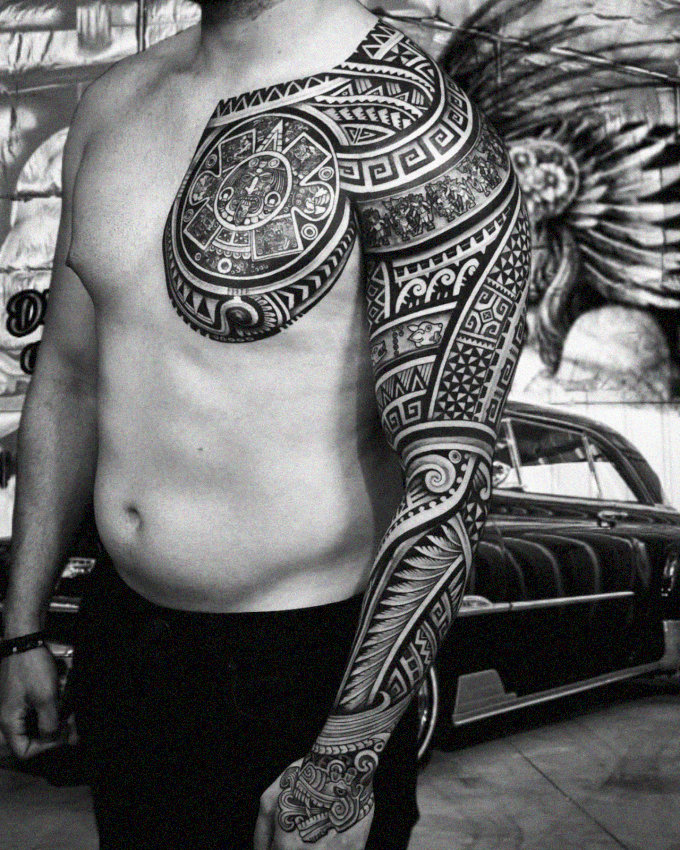 Shirtless Tattooed Man by Vintage Car