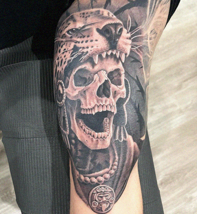 Leopard and Skull Tattoo Adorned With Beads