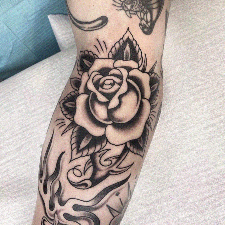 Intricate Rose Elegance in Tattoo Art