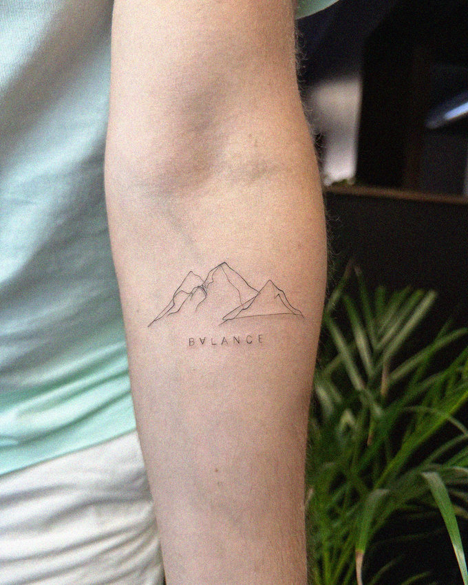 BVLANCE with Mountain Tattoo on Forearm