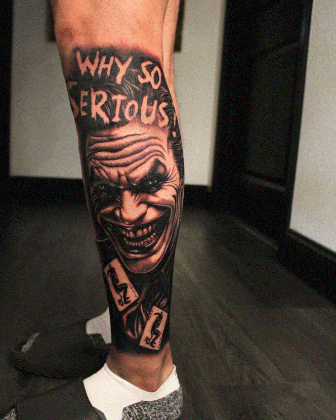 Joker's Face and Iconic Phrase Tattoo