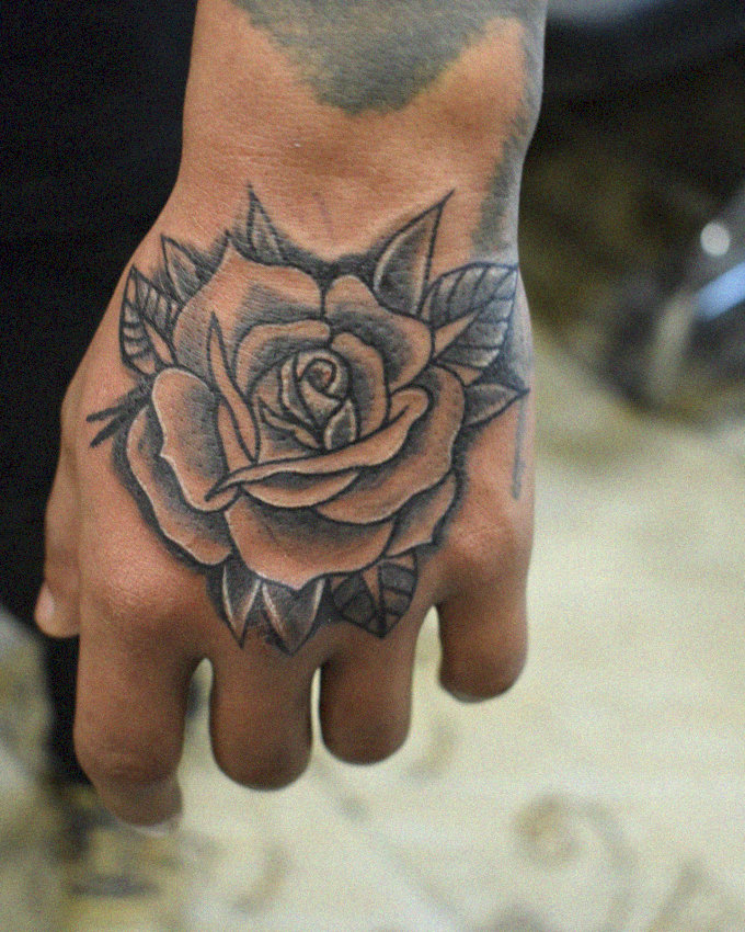Inky Rose Blossoms on Human Canvas