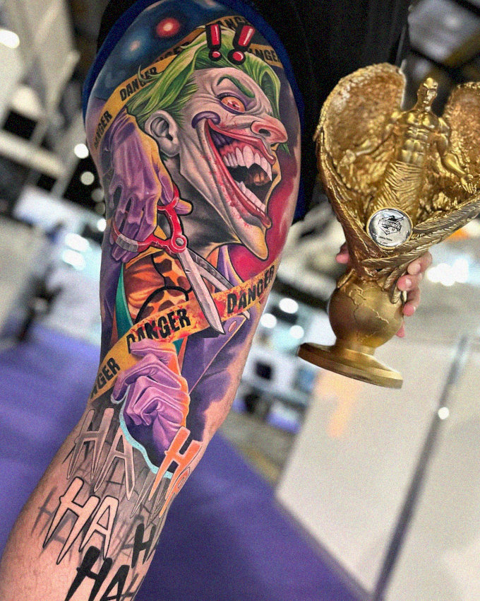 Joker Tattoo Triumph Shimmering in Gold