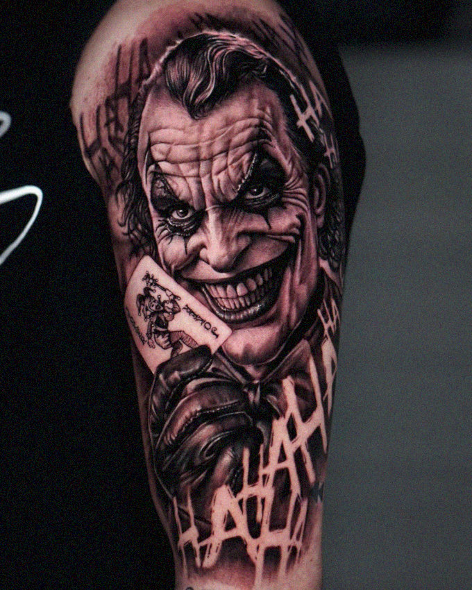Joker's Sinister Smile Tattooed on Leg